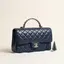 The navy quilted CHANEL flap bag being given away